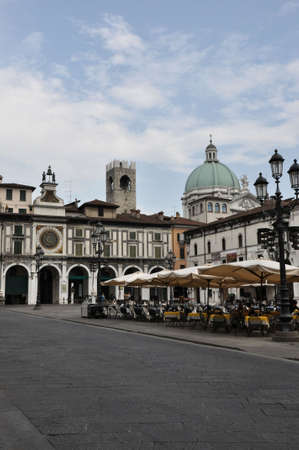 BRESCIA, ITALY - JULY 24: Piazza della Loggia a famous town square  on July 24, 2012 in Brescia, Italy. The square is built in Venetian building style.のeditorial素材