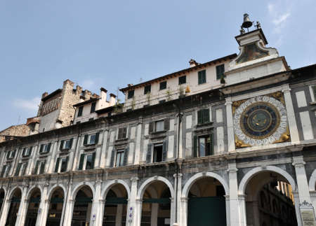 BRESCIA, ITALY - JULY 24: Astronomical clock on July 24, 2012 in Piazza Loggia, Brescia, Italy. Mechanical Clock Tower build in sixteen century.のeditorial素材