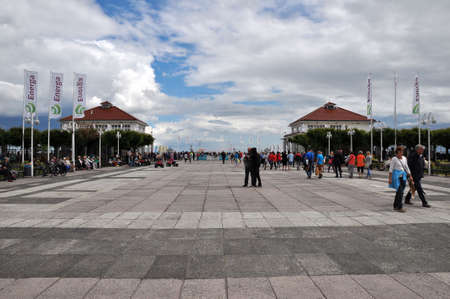 SOPOT, POLAND - JUNE 23: Tourist walking along the famous pier molo on June 23, 2015 in Sopot, Poland.Built in 1827 this 511.5m pier is the longest wooden pier in Europeのeditorial素材