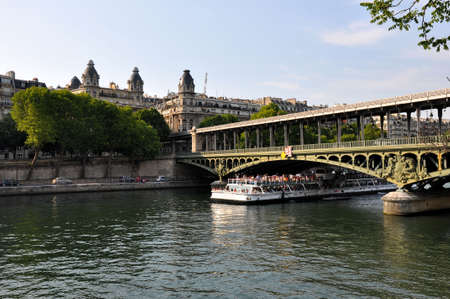 Boat tour near bridge of Bir-Hakeim over the Seine river in Paris, France.の写真素材