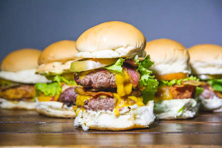 Beauty cheeseburger with a lot of cheeseの写真素材