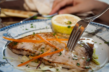 grilled swordfish threaded from the forkの写真素材