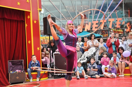 disneyland paris, august, 13, 2010 - disney village,  little circus entertainment hola hoop dancer in disney village out of disneyland parisのeditorial素材