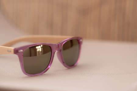 Classic sunglasses model shoot in a summer day closeup . Selective focusの写真素材