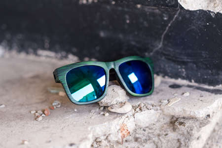 Classic sunglasses model shoot in creative indoor place closeup. Selective focusの写真素材