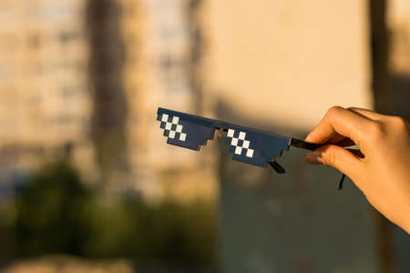 Thug Life Sunglasses shoot in a urban location in a sunny day. Selective focusの写真素材