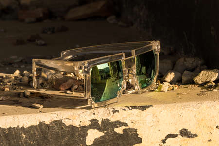 Pixel sunglasses model shoot in a urban place closeup in a sunny day. Selective focusの写真素材