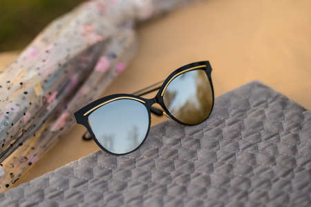 Cat Eye Sunglasses model for women with a very special design shoot outside in a summer day . Selective focusの写真素材