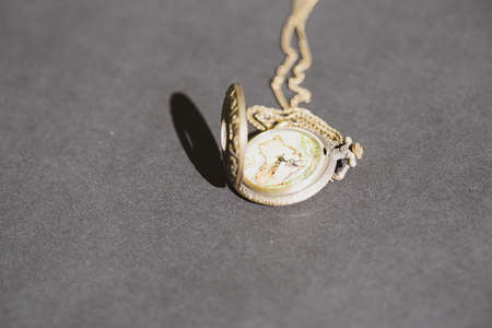 Vintage Pocket watch clock dial closeup. Selective Focus