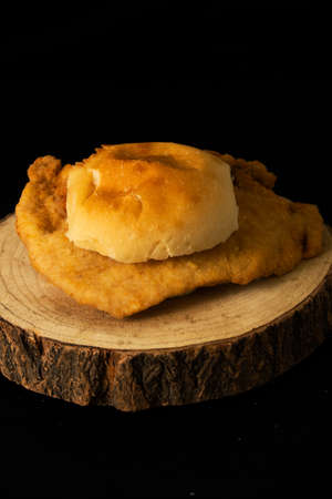 Chicken breaded sandwich with lettuce and tomato.の写真素材