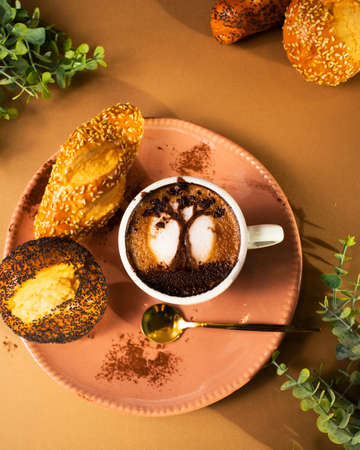 Breakfast cappuccino with bread.の写真素材
