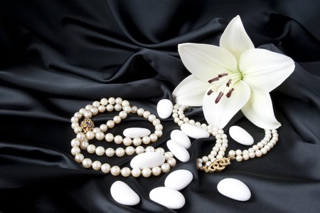 Jewelry and other precious stones on black background fabricの写真素材