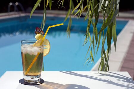 Iced drinks placed on board a private pool.の写真素材
