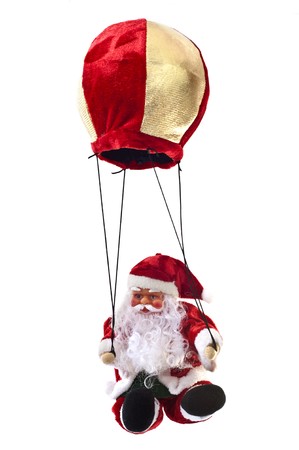 Santa Claus in a hot-air balloon on a white backgroundの写真素材