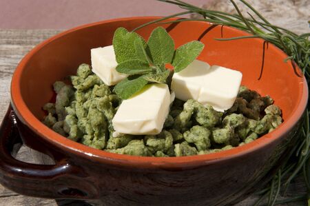 some dumplings fresh vegetables and aromatic herbsの写真素材