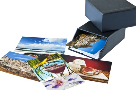 Business cards and container on white background
