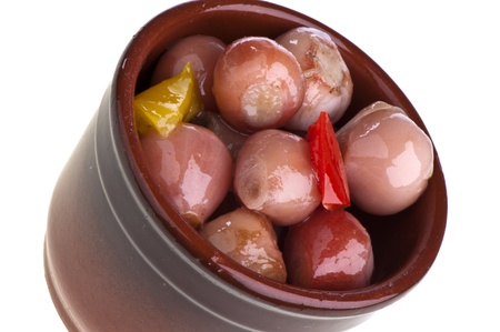 onions in oil with pieces of bell pepperの写真素材