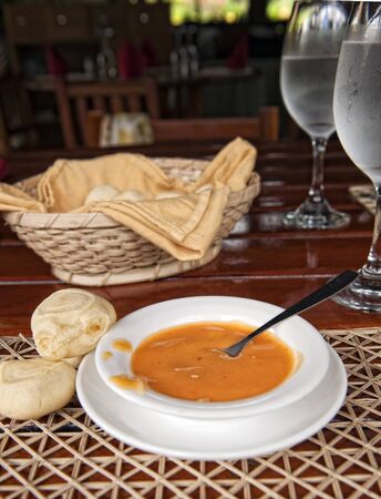 typical Ecuadorian hot sauce and bread of yuccaの写真素材