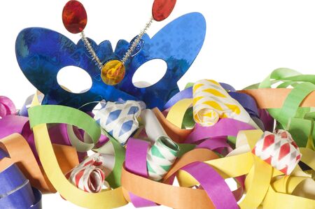 mask, streamers and confetti on white backgroundの写真素材
