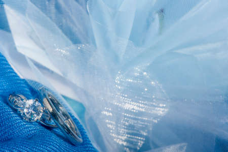  wedding rings on  a colorful fabric backgroundの写真素材