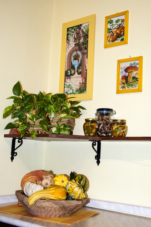 Decorative corner of a house with paintings needlepointのeditorial素材