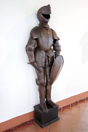 a medieval armor in a hall of a castle