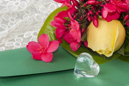 Flowers and crystal hearts for a Valentine's Dayの写真素材