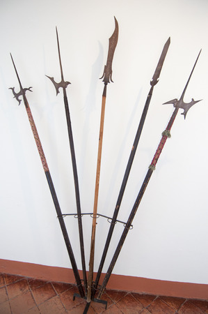 Ancient halberds in the corridor of a museumの写真素材