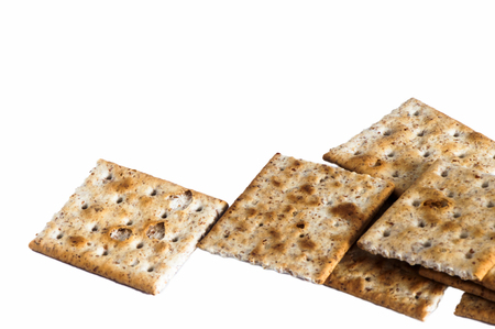 some whole wheat crackers on white backgroundの写真素材