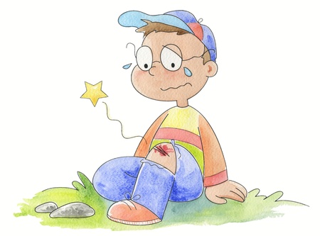 A crying boy with a scratch on his knee.の写真素材