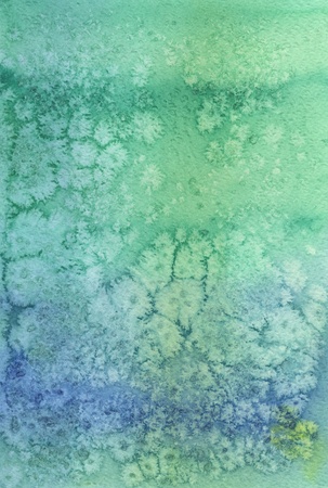 Greenish-blue graduated background hand made with watercolors の写真素材
