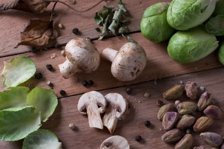 Still life mushroom, pistachio and brussels sproutsの写真素材