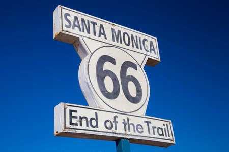 Sign on Santa Monica Pier marking the end of Route 66 Highway, California