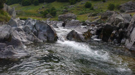flows in snowmelt river in high mountain