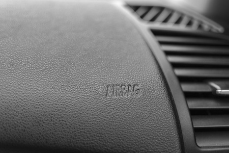 The word  Airbag  is inner beveled on a carの写真素材