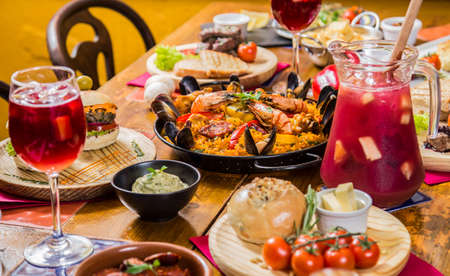 Paella, traditional sangria, wine, Spain, restaurantの写真素材