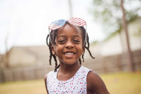 Cute Little Girl CelebratingMemorial Day or Independance Day
