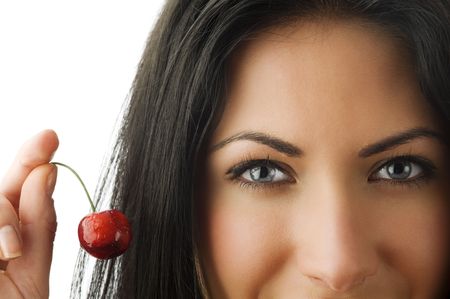 blue eyes close up of very cute girl with red cherry near
の写真素材
