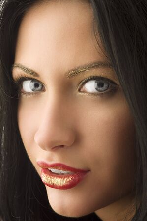 close up of a young very cute woman with unique make upの写真素材
