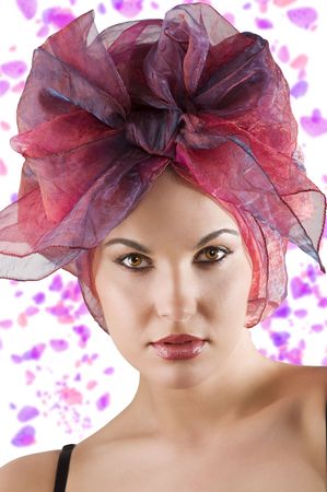 close up portrait beautiful woman with a colored headscarf looking like a brasilian girlの写真素材