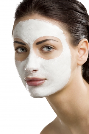 young woman getting beauty skin treatment on her faceの写真素材