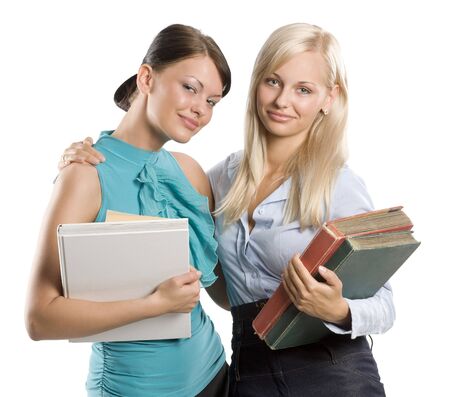 two nice student in act to be friend arming and looking in camera with sweet smileの写真素材