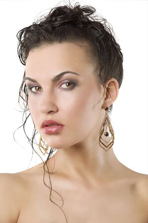 young beautiful brunette woman with hair style and nice jewellery の写真素材