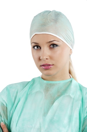 young beauty nurse in green operation dress with surgery capの写真素材