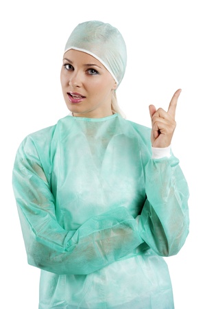 young beauty nurse in green operation dress acting to the cameraの写真素材