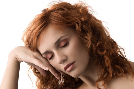 sweet portrait of cute red haired young woman with great makeupの写真素材