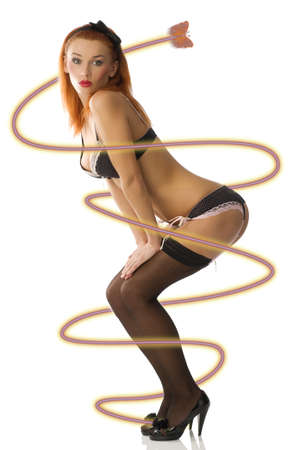 sexy redhead pin-up in black lingerie and black stockingの写真素材
