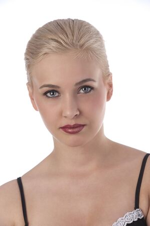 cute and young blond woman with hair style and red, yellow shine lips wearing black lingerieの写真素材