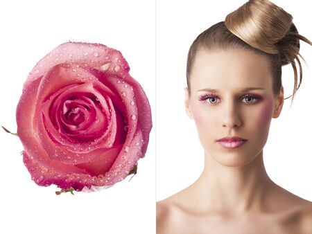 beauty young girl with a floral makeup. She is turned of three quarters and looks in to the lens with attractive expressionの写真素材