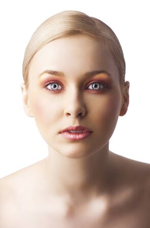 beauty young girl with a floral makeup. She is turned of three quarters and looks in to the lens with attractive expressionの写真素材